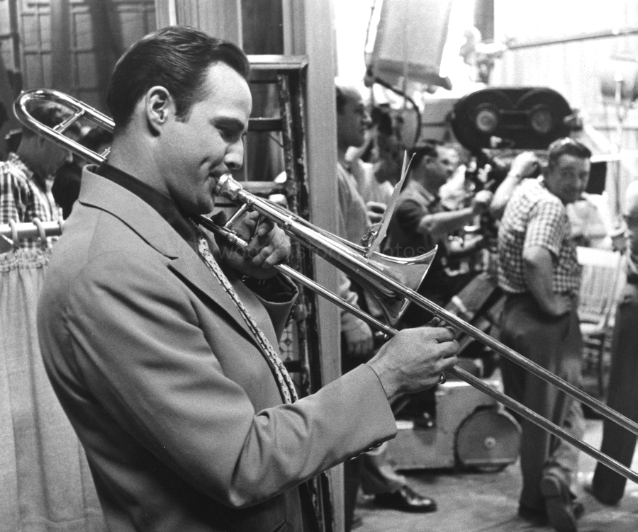 Marlon Brando 1955 Between scenes on Guys and Dolls practicing the trombone.jpg